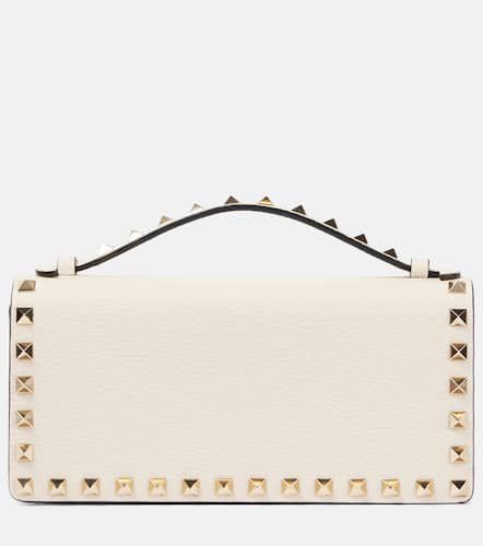 Clutch in pelle con borchie - Valentino Garavani - Modalova