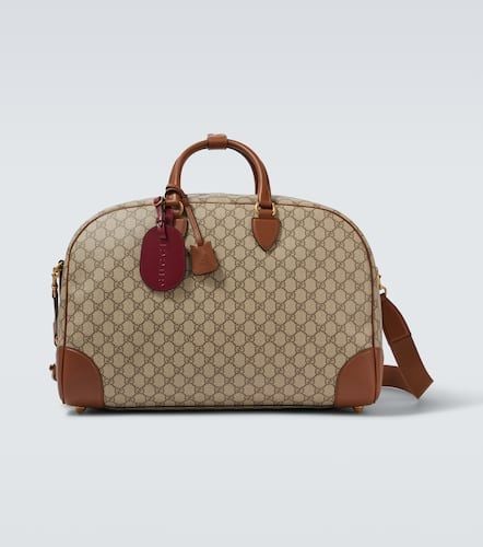 Borsa da viaggio GG Emblem Medium con pelle - Gucci - Modalova