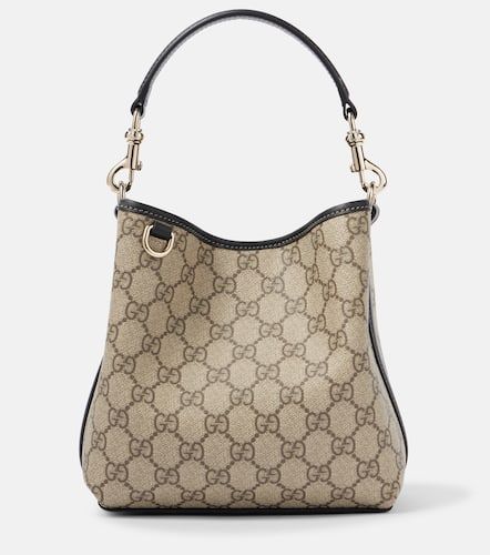 Bolso GG Emblem Mini de lona revestida - Gucci - Modalova