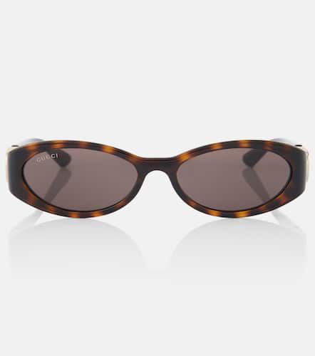 Gucci Gafas de sol ovaladas con GG - Gucci - Modalova