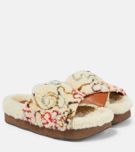 Chloé Pantoletten Wavy aus Shearling und Leder - Chloe - Modalova