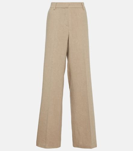 High-rise tapered leather pants in beige - Magda Butrym