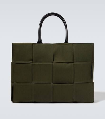 Tote Arco East-West de lona con piel - Bottega Veneta - Modalova