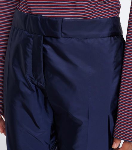 Pantaloni flared in tessuto tecnico - Miu Miu - Modalova
