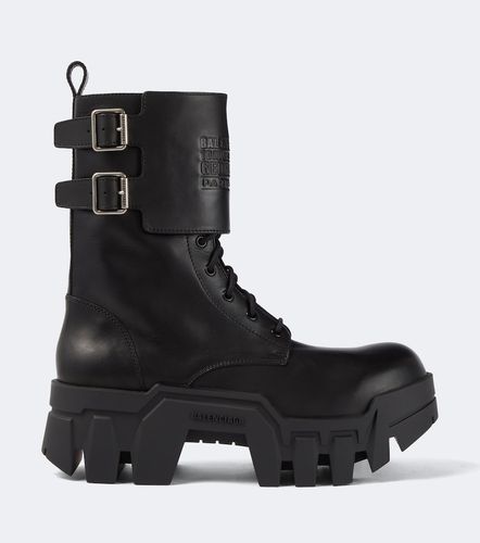 Bulldozer debossed leather combat boots - Balenciaga - Modalova