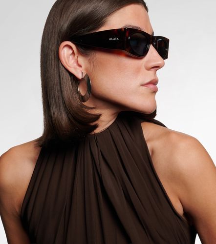 Alaïa Occhiali da sole cat-eye con logo - Alaia - Modalova