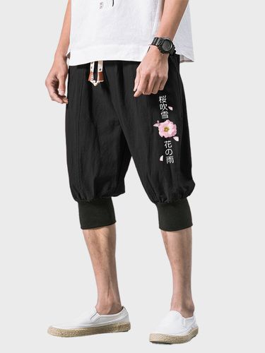 Pantalones cortos sueltos con cintura con cordón y estampado de flores de cerezo japonés para hombre - ChArmkpR - Modalova