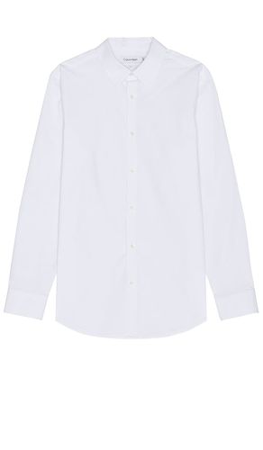 Solid Stretch Slim Shirt in . Size M, S, XL/1X - Calvin Klein - Modalova