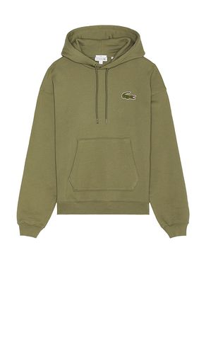 Sudadera loose fit en color verde oliva talla L en - Olive. Talla L (también en M) - Lacoste - Modalova