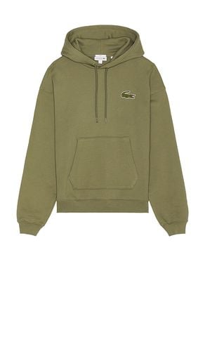 Sudadera loose fit en color verde oliva talla L en - Olive. Talla L (también en M, S) - Lacoste - Modalova