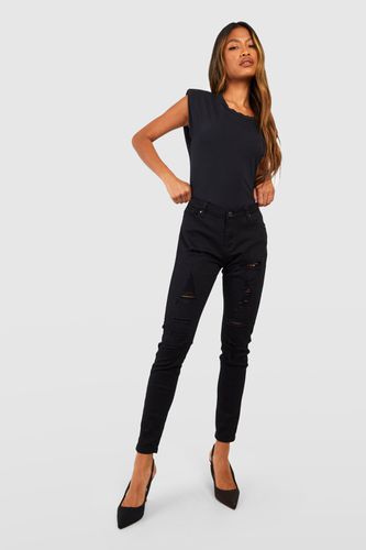 Womens Mid Rise Distressed Super Skinny Jeans - - 6 - boohoo - Modalova
