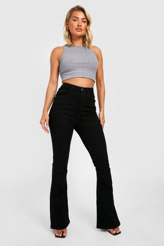 Womens High Waisted Butt Shaping Skinny Split Hem Flared Jeans - - 12 - boohoo - Modalova
