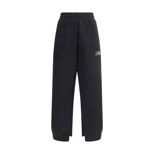 Logoed Sweatpants with Raw-Cut Slits - MM6 Maison Margiela - Modalova