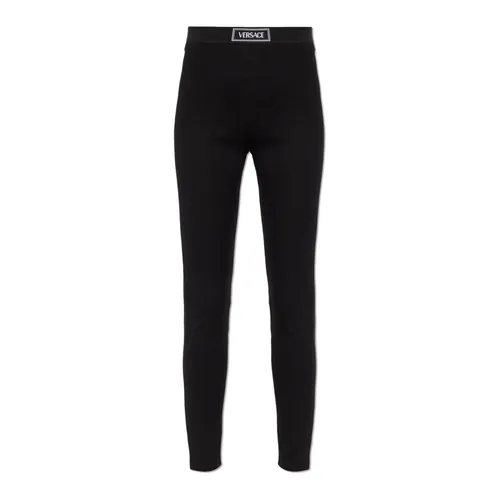 Leggings with logo patch - Versace - Modalova
