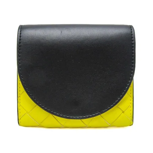 Gebrauchte Intrecciato Leder Brieftasche GelbSchwarz - Bottega Veneta Vintage - Modalova