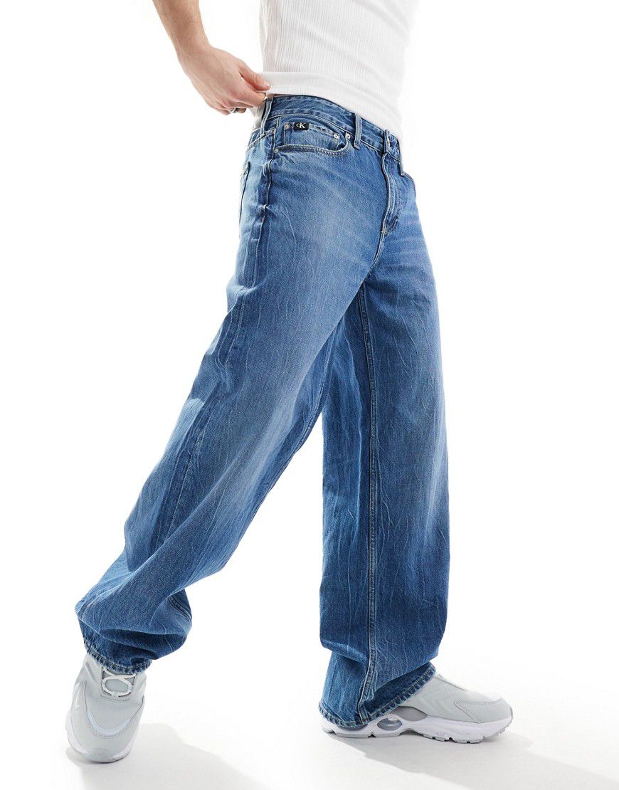 Jeans dritti ampi lavaggio scuro - Calvin Klein Jeans - Modalova
