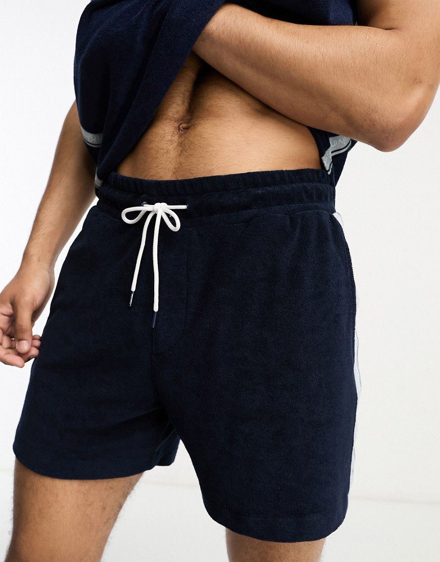 Pantaloncini in spugna navy con fettuccia con logo in coordinato - Calvin Klein - Modalova