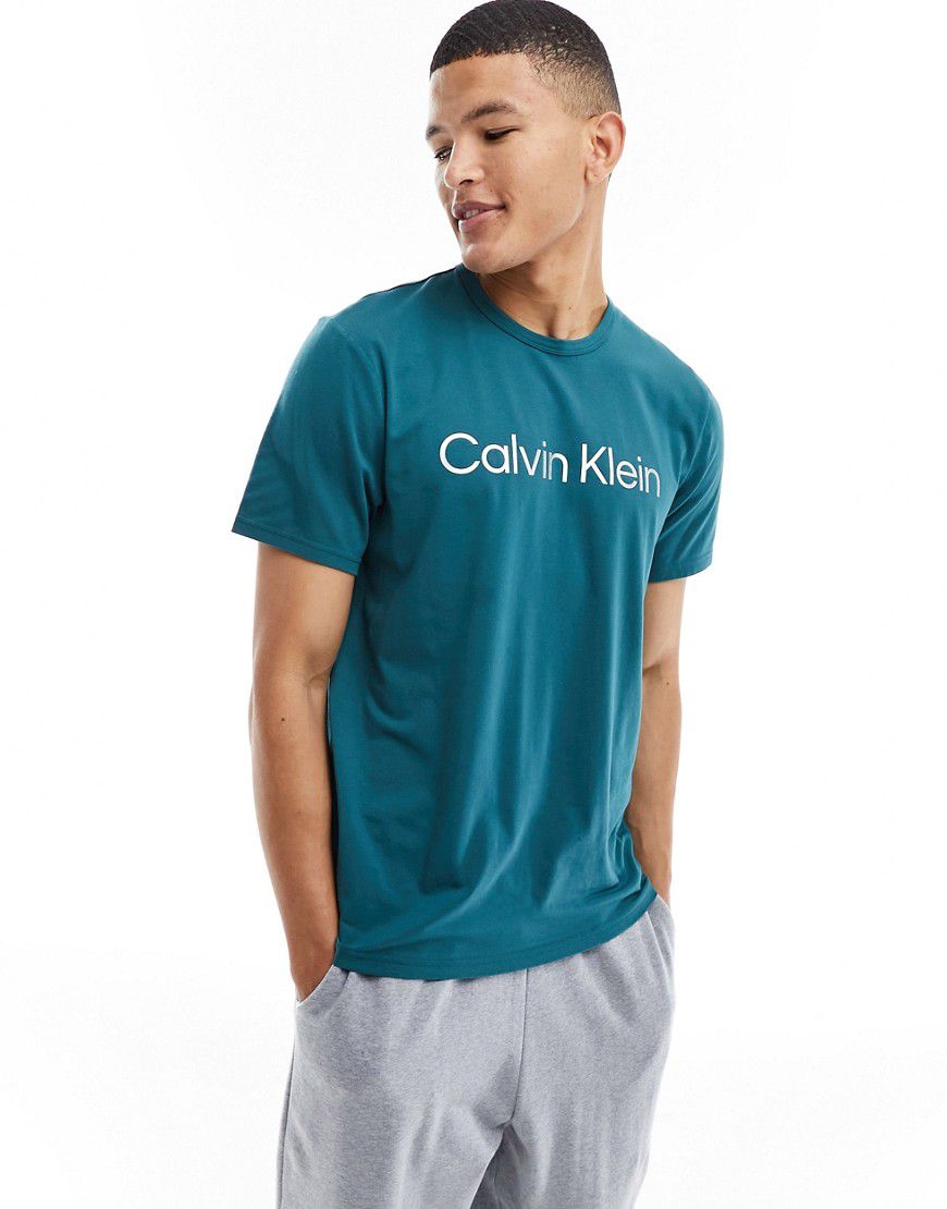 T-shirt da casa verde-azzurra con logo sul petto - Calvin Klein - Modalova