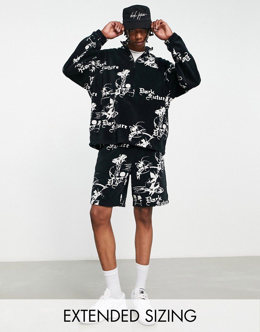 ASOS Dark Future - Pantaloncini comodi in pile polar neri con stampa del logo - ASOS DESIGN - Modalova