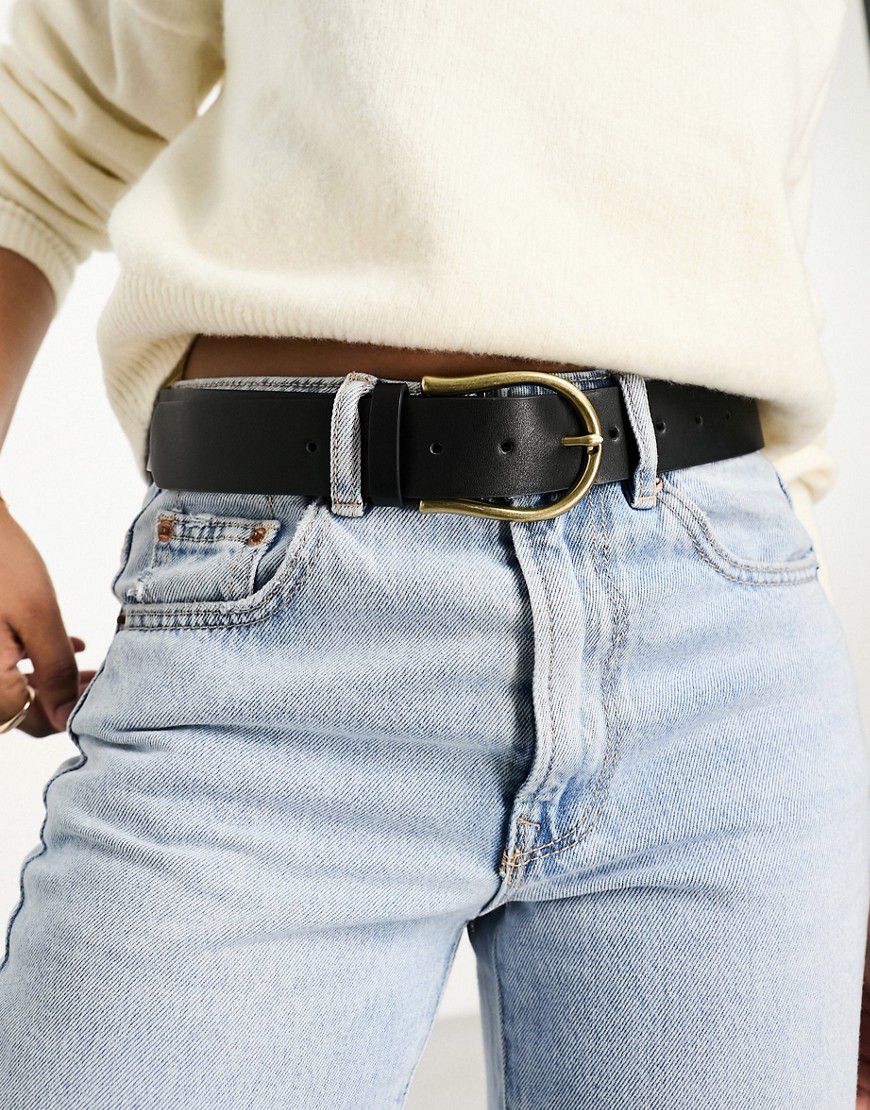 Cintura da jeans per vita e fianchi nera con fibbia a mezzaluna - ASOS DESIGN - Modalova