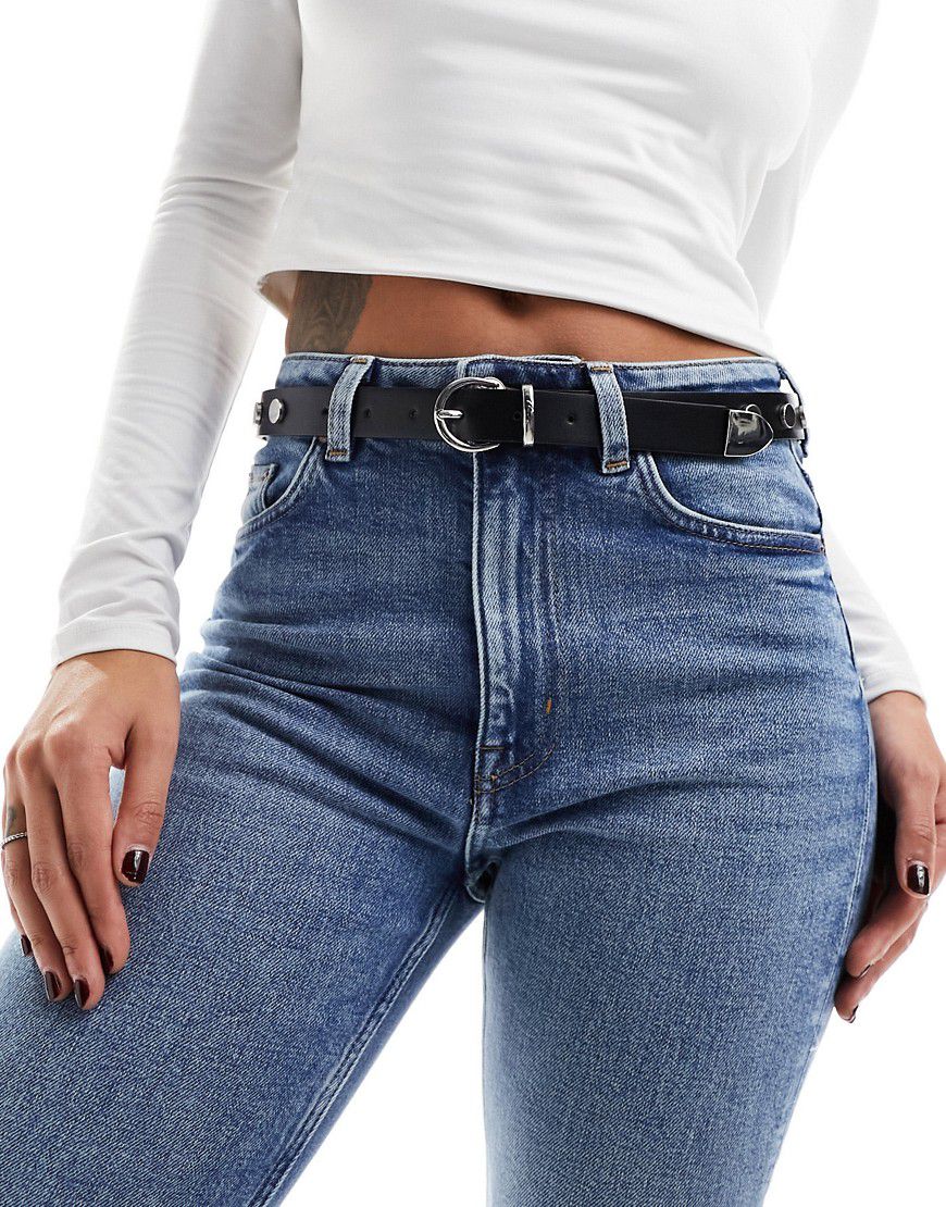 Cintura per jeans per vita e fianchi nera con borchie - ASOS DESIGN - Modalova