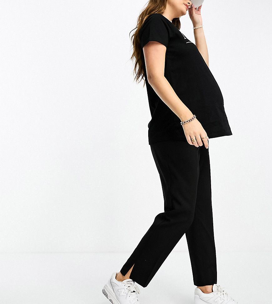 ASOS DESIGN Maternity - Pantaloni a slim a sigaretta con fascia sopra il pancione neri - ASOS Maternity - Modalova