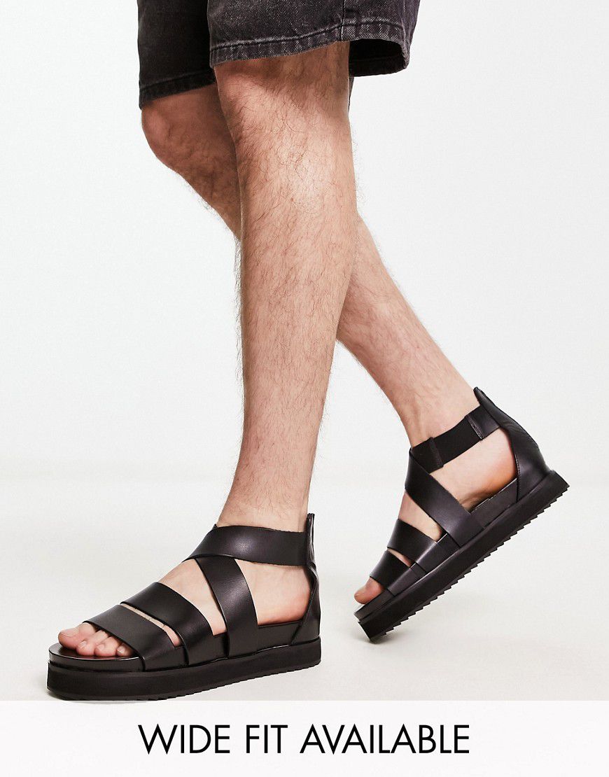 Sandali gladiatore in pelle nera con suola spessa - ASOS DESIGN - Modalova