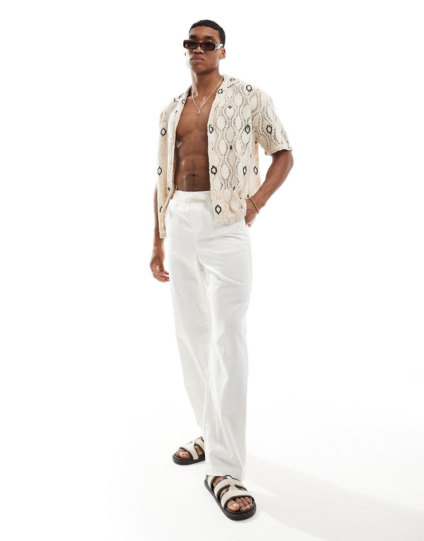Pantaloni comodi in lino bianchi con elastico in vita - ASOS DESIGN - Modalova