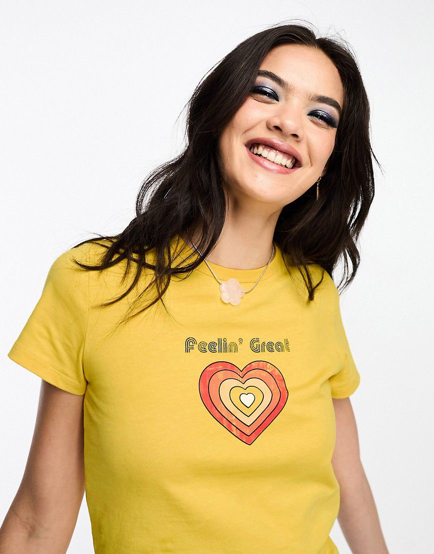 T-shirt mini gialla con stampa anni '70 "Feeling great" - ASOS DESIGN - Modalova