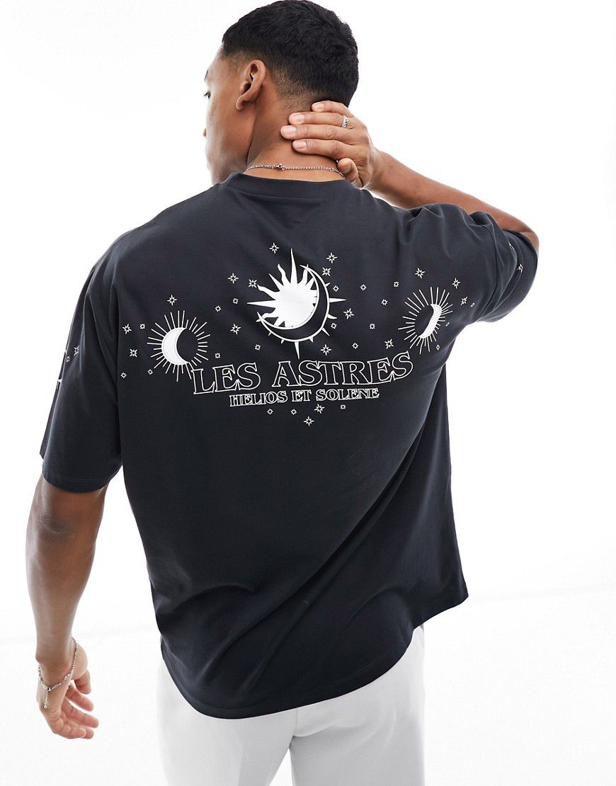 T-shirt oversize nera con stampa celestiale sul retro - ASOS DESIGN - Modalova
