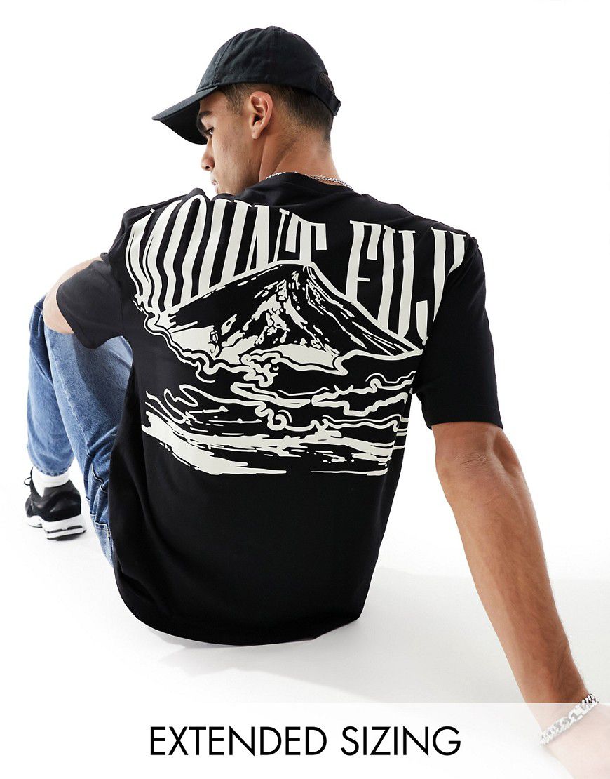 T-shirt oversize nera con stampa di montagne sulla schiena - ASOS DESIGN - Modalova