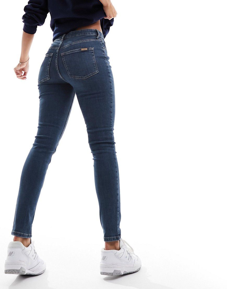 Ultimate - Jeans skinny medio scuro - ASOS DESIGN - Modalova