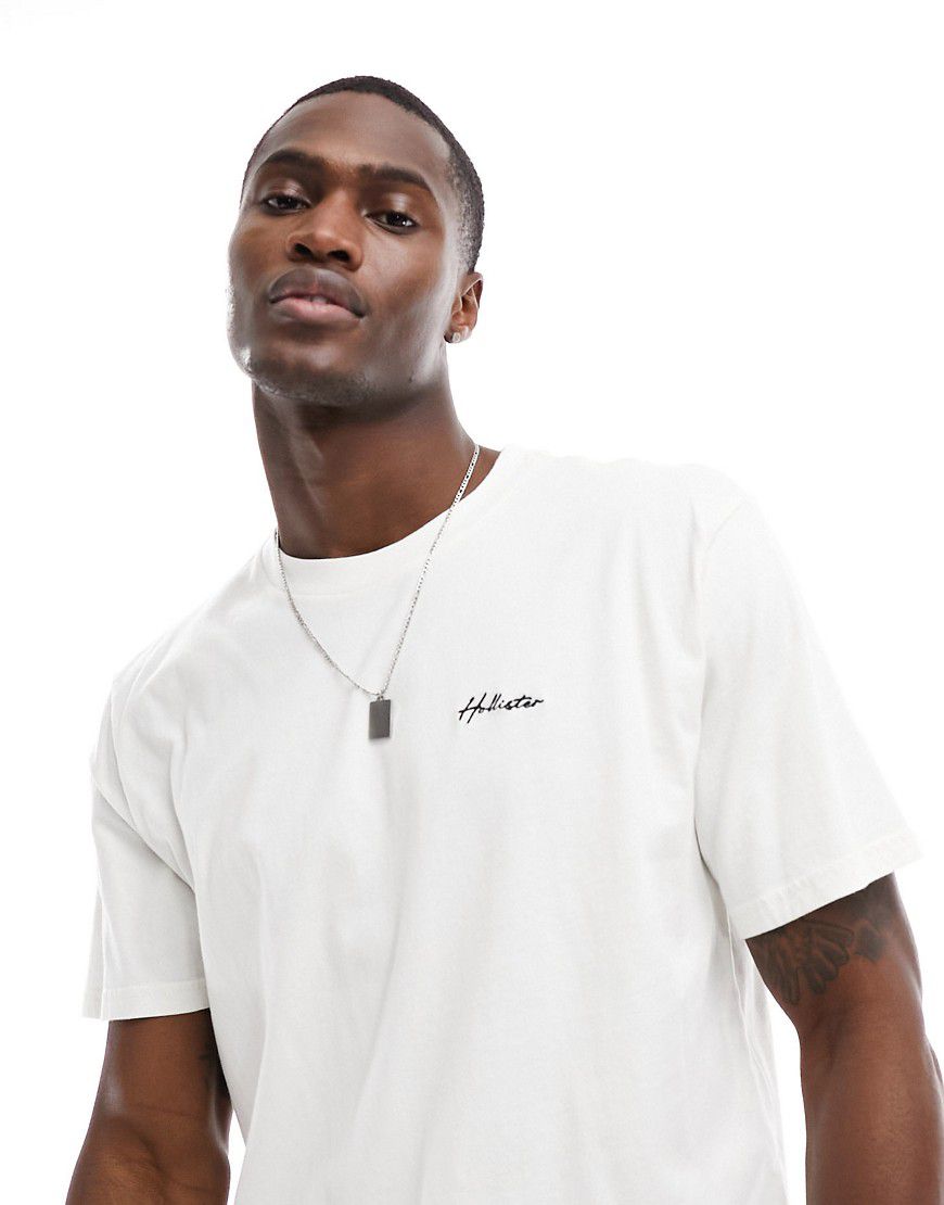 T-shirt bianca con logo centrale piccolo - Hollister - Modalova