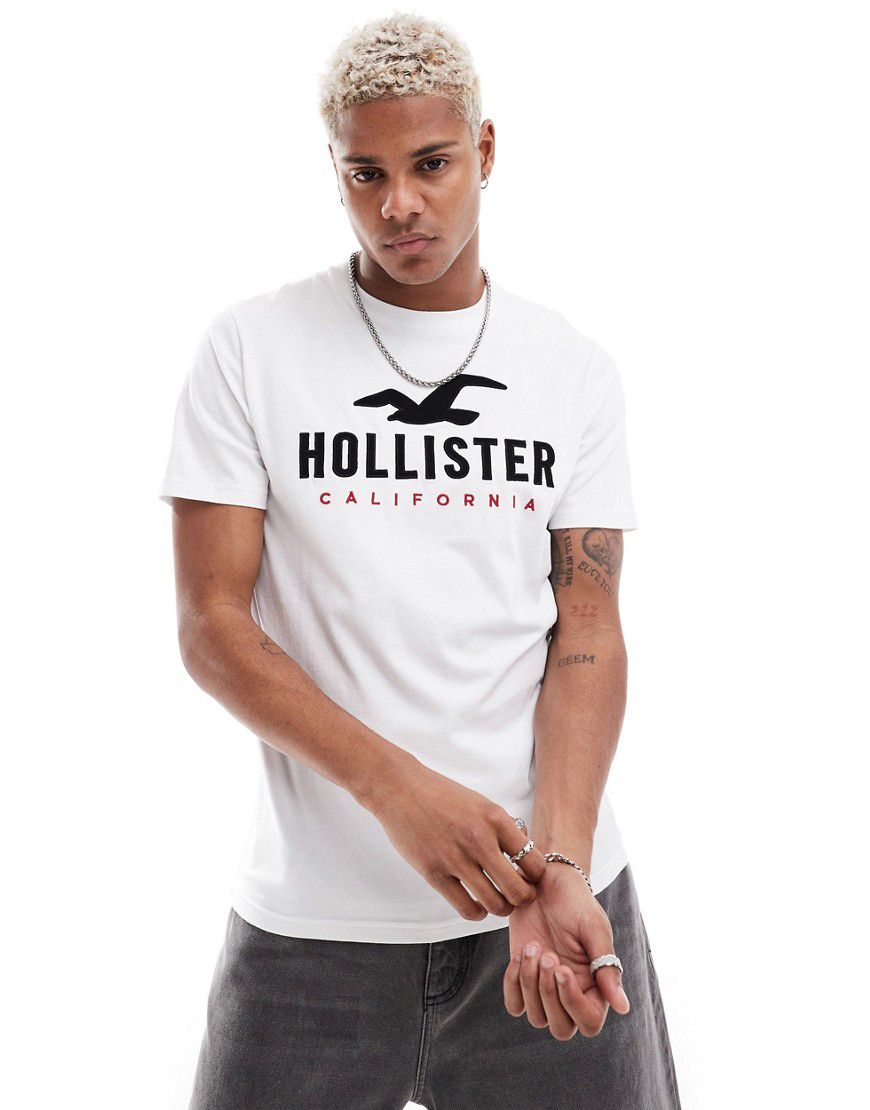 T-shirt tecnica bianca con logo - Hollister - Modalova