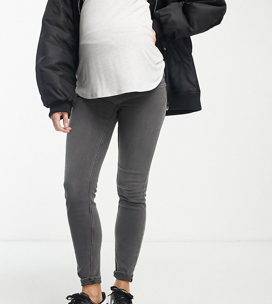 Mamalicious Maternity - Jeans premaman skinny con fascia sopra il pancione medio - Mama.licious - Modalova