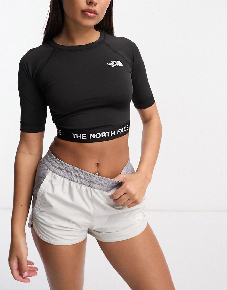 T-shirt tecnica da allenamento taglio corto nera a maniche lunghe - The North Face - Modalova