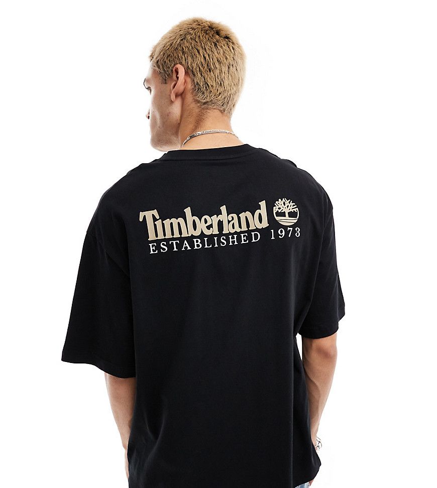 T-shirt oversize nera con logo grande sulla schiena - In esclusiva per ASOS - Timberland - Modalova