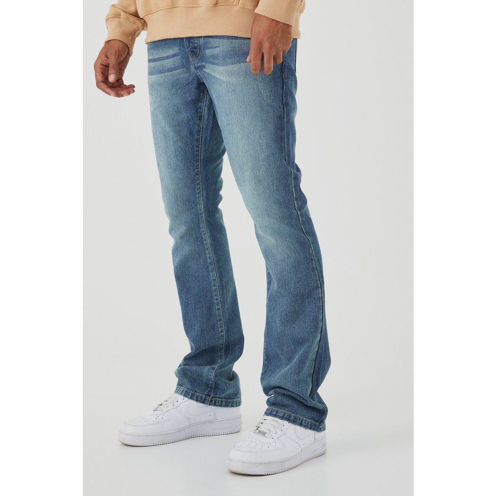 Jeans a zampa Slim Fit in denim rigido - boohoo - Modalova