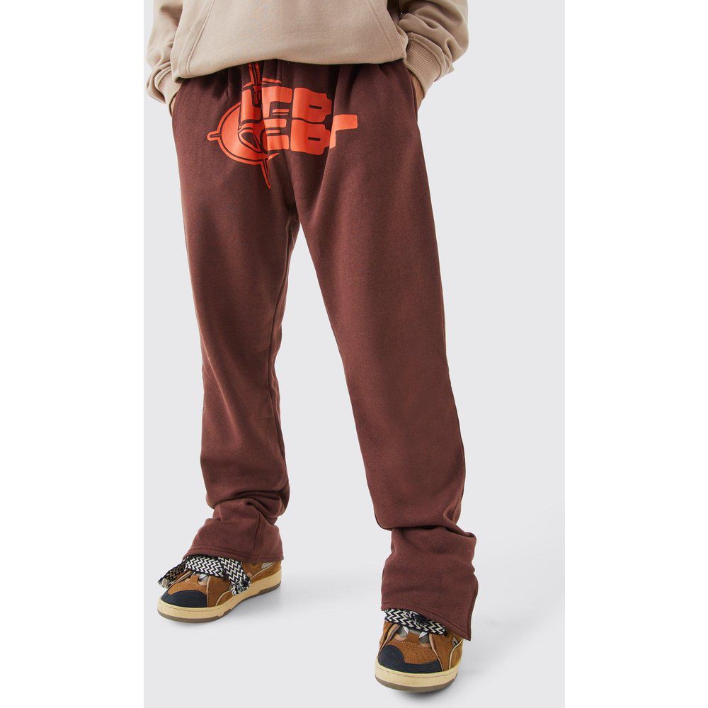 Pantaloni tuta con grafica Target e spacco sul fondo - boohoo - Modalova